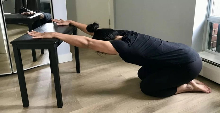 modified-childs-pose-the-scoliclinic.jpg