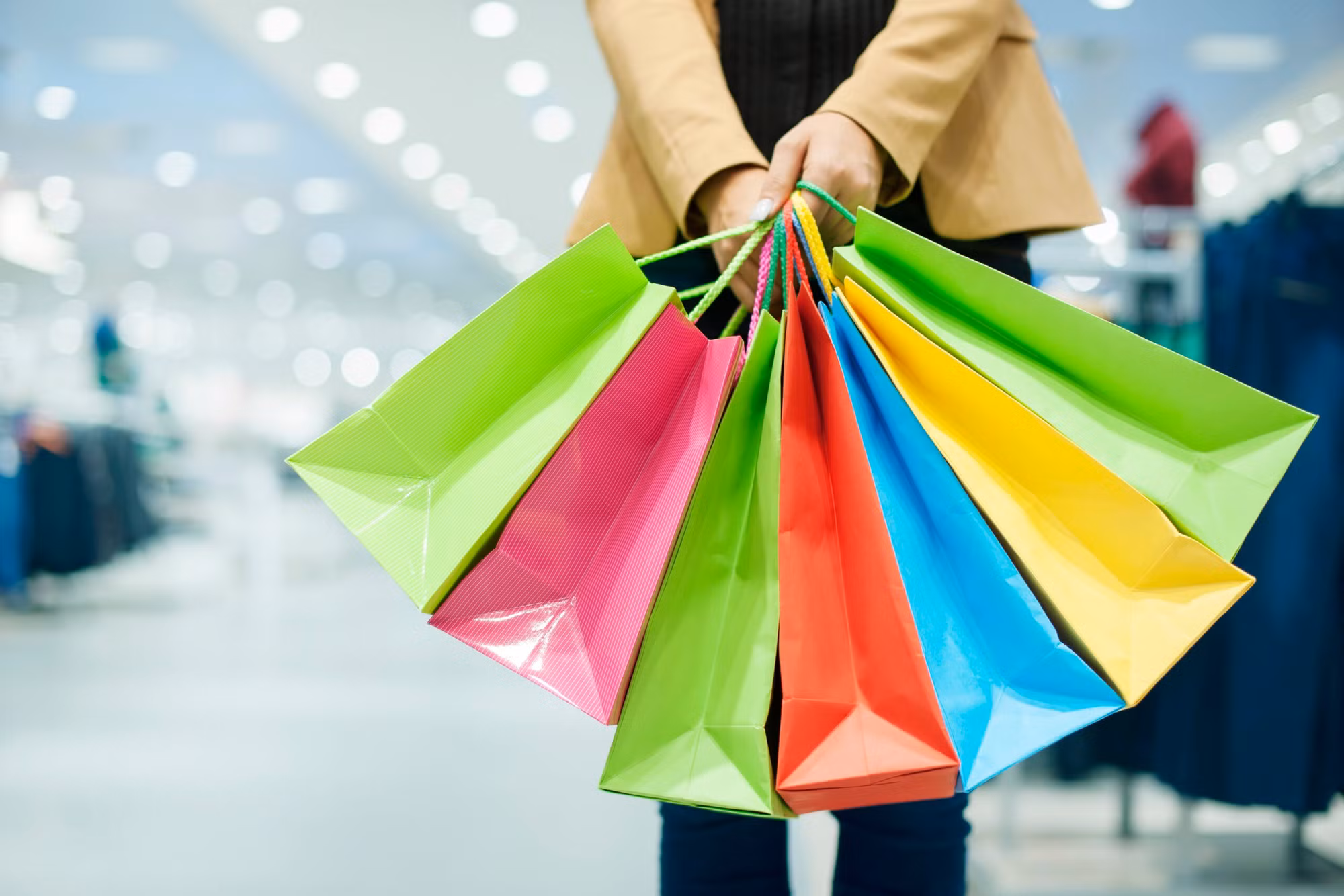 woman-with-shopping-bags-scaled.jpg