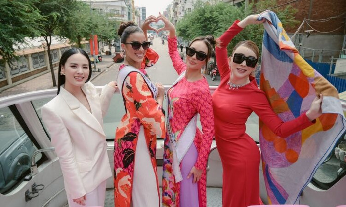 Miss Universe 2022 diện trang phục của các nhà mốt Việt ảnh 3 Miss Universe 2022 diện áo dài dạo chơi ở TP HCM