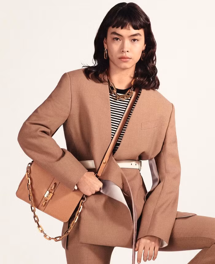 lv rendez vous bag in beige color