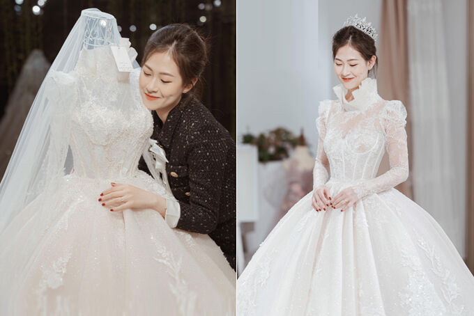 Calla Haute Couture - Những bộ váy cưới xa xỉ trị giá hàng tỷ đồng của NTK Phương Linh ảnh 5 Váy cưới phong cách hoàng gia của cô dâu Khánh Huyền có dáng xòe bồng bềnh, tùng váy xếp ly và đuôi dài được làm bằng chất liệu ren tơ mờ Pháp. Phần cổ áo tạo dáng một bông hoa calla e ấp nở, tôn vóc dáng nhỏ mảnh, cổ cao thon, gương mặt đài các của cô dâu.