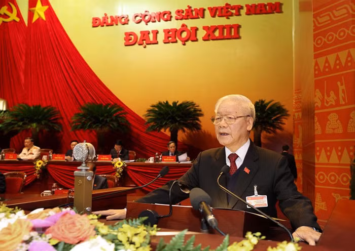 Tổng Bí thư, Chủ tịch nước Nguyễn Phú Trọng đọc Báo cáo của BCH Trung ương Đảng khóa XII về các văn kiện trình Đại hội XIII của Đảng. (Ảnh: TTXVN)