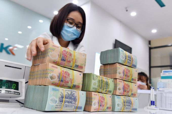 Lãi suất huy động dự kiến hạ nhiệt bất chấp áp lực tín dụng dâng cao
