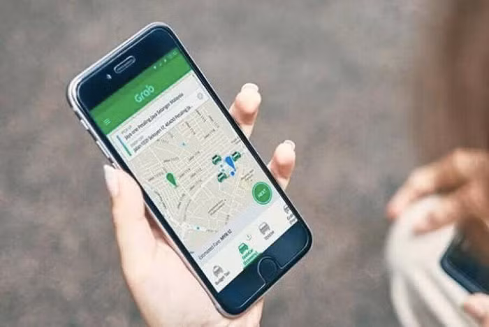 Đề nghị Grab, Uber ngừng đầu tư thêm xe mới