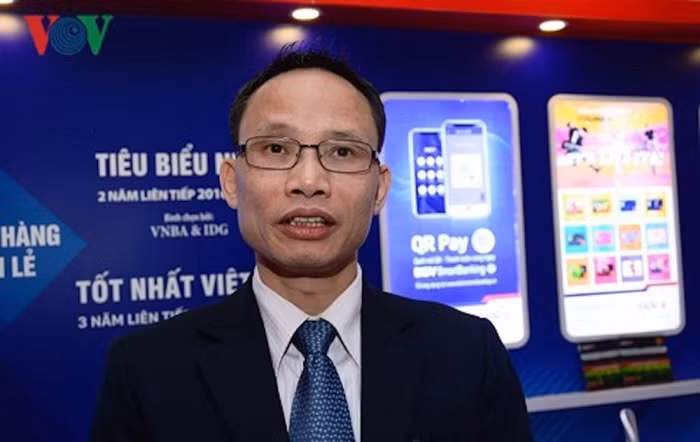 Mỗi ngân hàng Việt đang phải dùng cả nghìn người để đếm tiền mặt ảnh 1