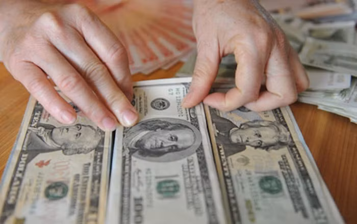 Tỷ giá USD/VND hôm nay ngày 1/12: Giá đô thế giới neo ở mức thấp, chợ đen ổn định