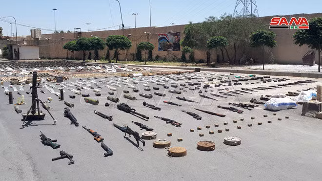 Những vũ khí trang bị An ninh quân đội Syria thu giữ được từ lực lượng nổi dậy ở tỉnh Daraa