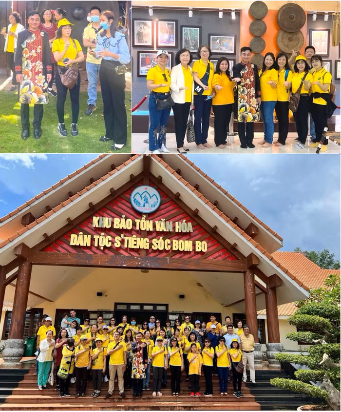 Khoác áo dài thổ cẩm, ông Trần Quốc Duy - Giám đốc TT XTĐT,TM&amp;DL tỉnh cùng hướng dẫn viên của Khu bảo tồn tích cực quảng bá hình ảnh Bình Phước.