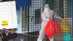 Một nhân viên y tế đang xử lý chất thải nguy hại từ trung tâm cách ly virus Nipah tại một bệnh viện ở Kozhikode, thuộc bang Kerala phía nam Ấn Độ. Ảnh: AFP/Getty Images