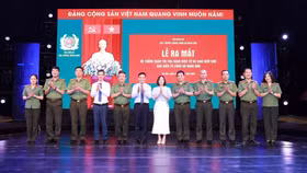 Các đại biểu dự lễ ra mắt hệ thống quản trị toà soạn điện tử và giao diện mới Báo điện tử CAND