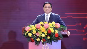 Thủ tướng Phạm Minh Chính phát biểu tại Ngày Chuyển đổi số quốc gia (10/10). Ảnh: TTXVN