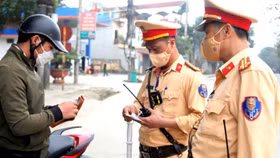 Chính phủ đã bỏ đề xuất cảnh sát giao thông được trích tối thiểu 70% tiền xử phạt 