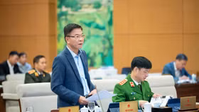 Bộ trưởng Bộ Tư pháp Lê Thành Long tại phiên họp sáng nay