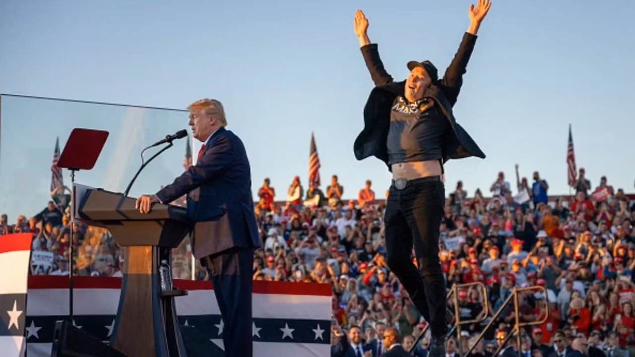 tesla-ceo-elon-musk-r-jumps-on-stage-as-he-joins-former-us-president-and-republican-presidential-candidate-donald-trump-during-a-campaign-rally-at-site-of-his-first-assassination-attempt-in-butler-pennsylvania-on-october-5-2024.jpg