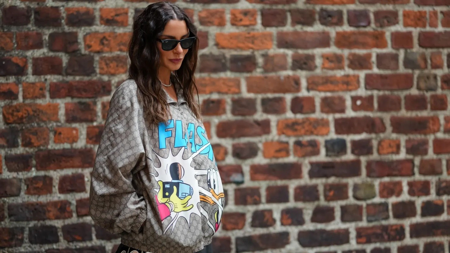 Người mẫu diện chiếc áo khoác Gucci x Donald Duck tại Tuần lễ Thời trang Copenhagen, Đan Mạch. 108182846-1754561217026-gettyimages-2228592462-dsc04877.jpg