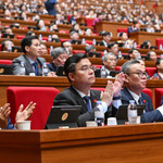 Các đại biểu dự phiên thảo luận ở hội trường chiều 21/1