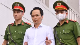 Nhà đầu tư mua cổ phiếu của ông Trịnh Văn Quyết cần làm gì để nhận tiền bồi thường?