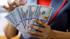 Tỷ giá USD hôm nay ngày 22/12: Cơn sốt USD chợ đen hạ nhiệt, ngân hàng âm thầm tăng