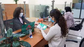 Hoàn phí giao dịch đối với chủ sử dụng lao động vay ngân hàng chính sách xã hội