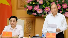 Thủ Tướng: Không để bị động khi điều hành chính sách tiền tệ