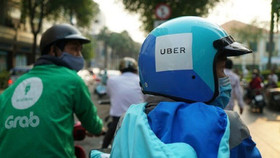 Trả hồ sơ để điều tra bổ sung vụ Grab mua lại Uber