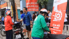 Grab tung khuyến mãi, khách hàng thực sự được lợi?