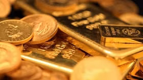 Đồng USD tăng đẩy giá vàng giảm