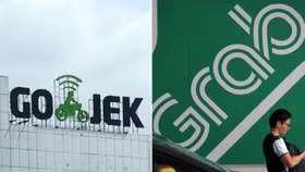 Grab và Gojek sáp nhập, thị trường gọi xe Việt Nam sẽ chỉ còn một cái tên?