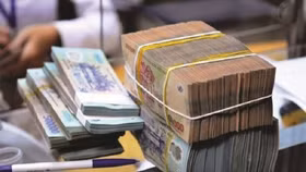 Chuyên gia nói gì về động thái nới room tín dụng của NHNN?