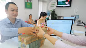 Đồng loạt giảm lãi suất: Chờ sự bùng nổ dòng tiền