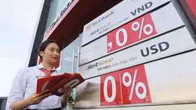 Lãi suất huy động có thể chịu áp lực trong thời gian tới