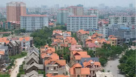 Hà Nội: Căn hộ giảm giá, nền đất lên ngôi
