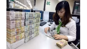 Lãi đậm 8.212 tỷ đồng, Vietcombank giảm nợ xấu về 1,44%