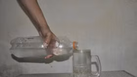 Rượu pha bằng... thuốc sâu và phân lân bán khắp Hà Nội