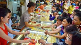 Làm cách nào huy động vàng và ngoại tệ trong dân?