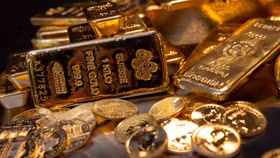 Vàng lại tăng khi Fed phát tín hiệu tạm ngừng lộ trình lãi suất