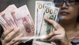 Căng thẳng thương mại leo thang, đồng Nhân dân tệ giảm "sức hấp dẫn"
