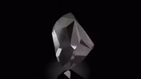 Viên kim cương đen tự nhiên "The Enigma" 555,55 carat được đấu giá tại Sotheby’s UAE