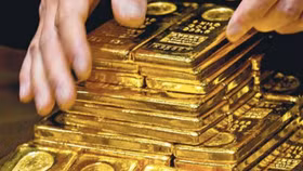 Fed giảm lãi suất, giá vàng đi xuống