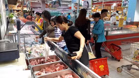 Các Bộ ngành và hệ thống ngân hàng tham gia “giải cứu thịt lợn”