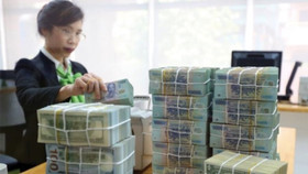 Ngân hàng ồ ạt tăng lãi suất tiền gửi sau Tết Nguyên đán