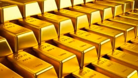 Giá vàng tăng mạnh, USD suy yếu sau tín hiệu hạ lãi suất từ Fed