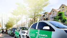 Grab sẽ phải gắn biển “taxi điện tử”?