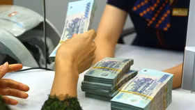 Giảm áp lực lên lãi suất huy động và cho vay