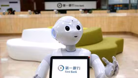 Các ngân hàng thế giới sử dụng robot, đẩy mạnh phương thức trực tuyến trong thời kỳ đại dịch