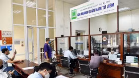 Bộ Nông nghiệp và Môi trường đề nghị các địa phương sắp xếp các Chi nhánh Văn phòng đăng ký đất đai trên địa bàn cấp huyện hiện nay thành các Chi nhánh Văn phòng đăng ký đất đai đặt tại đơn vị hành chính cấp xã hoặc khu vực liên xã, phường, bảo đảm thực hiện tốt công tác quản lý đất đai. Ảnh minh họa.