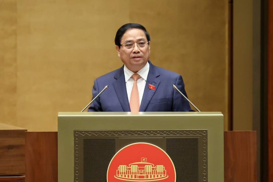 Thủ tướng Chính phủ Phạm Minh Chính trình bày Báo cáo tóm tắt kết quả thực hiện Kế hoạch phát triển kinh tế - xã hội năm 2025 và 5 năm 2021 - 2025; dự kiến kế hoạch phát triển kinh tế - xã hội năm 2026 img3456-1760930149544507437704-8188.jpg