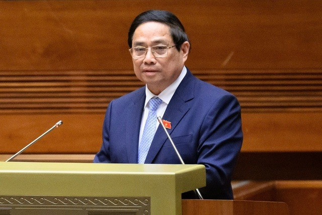 Thủ tướng Chính phủ Phạm Minh Chính báo cáo tại phiên họp