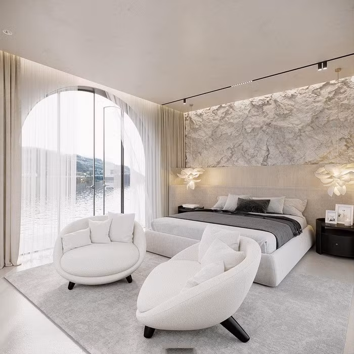 Không gian phòng ngủ thoáng đãng, có view hồ mát mẻ và cửa lớn giúp đón ánh sáng tự nhiên