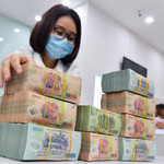 Lãi suất huy động dự kiến hạ nhiệt bất chấp áp lực tín dụng dâng cao